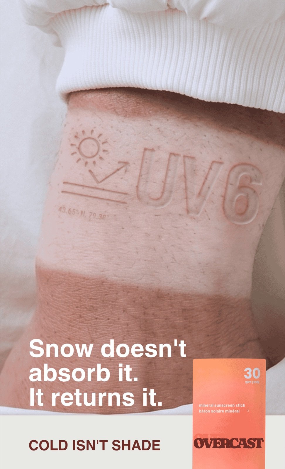 Poster — a wrist with a tan line and UV 6 pressed into the pale skin. Caption reads Snow doesn't absorb it. It returns it.