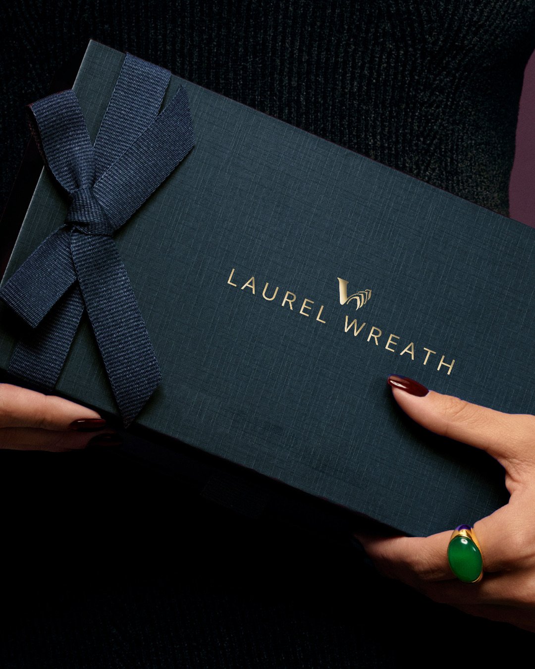 Laurel Wreath gift box packaging with grosgrain ribbon and gold foil logo
